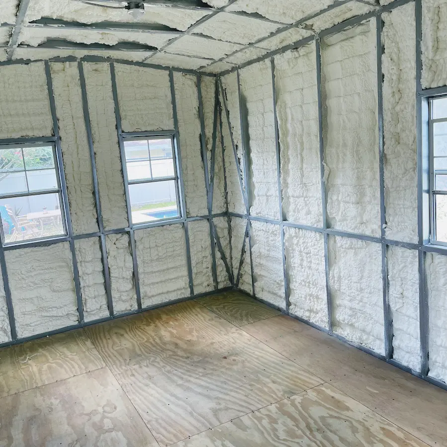 Closed-cell spray foam insulation applied to wall cavities in a residential project in Jupiter